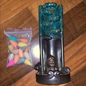 Golden incense smoke waterfall